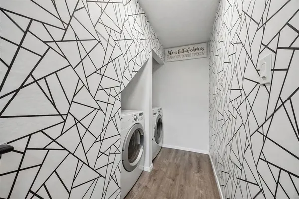 a utility room with dryer and washer