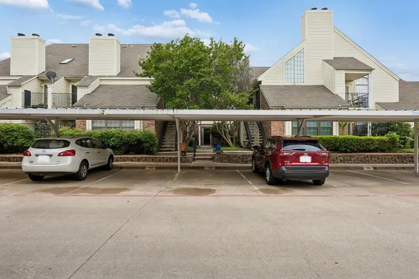 a car parked in front of a house