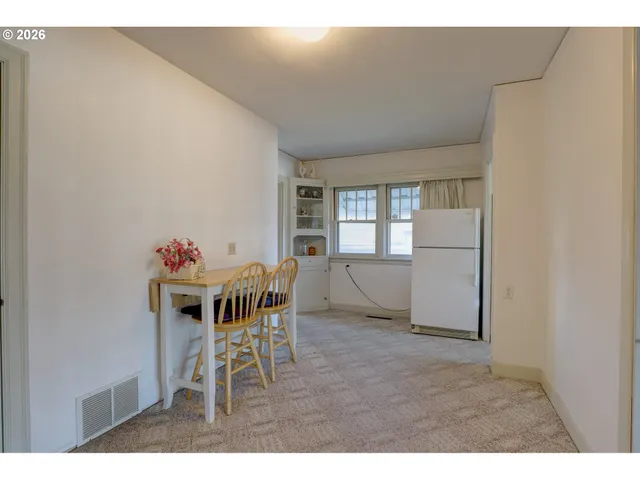 a view of a kitchen with a sink