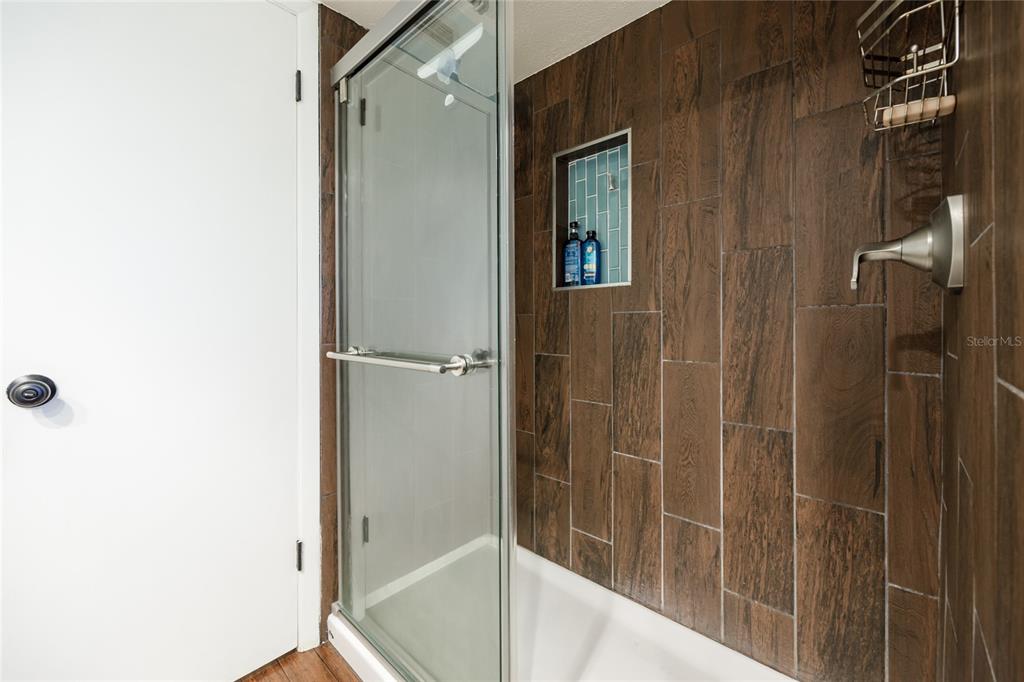 2006 Northwest 104th Way Gainesville, FL 32606 - Photo 36 of 71 a bathroom with a shower and a sink