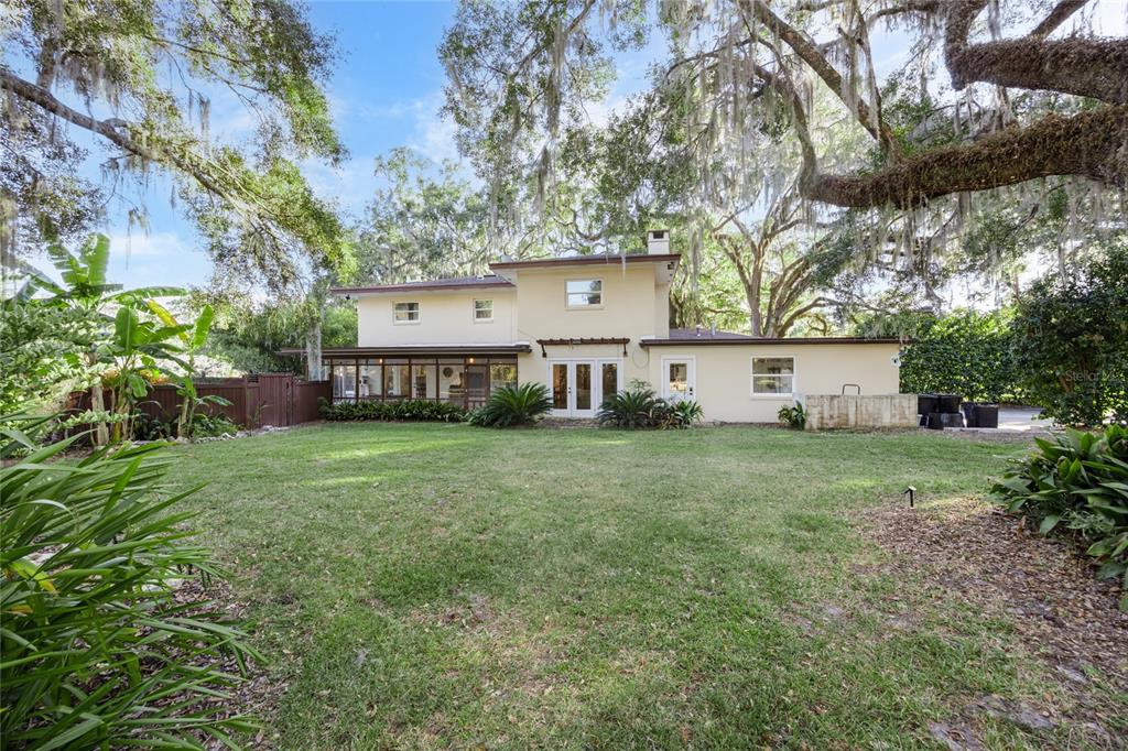 2006 Northwest 104th Way Gainesville, FL 32606 - Photo 67 of 71 a view of a house with a back yard