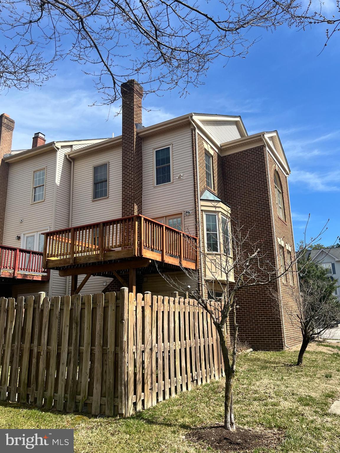 2034 Pinecroft Court Odenton, MD 21113 - Photo 24 of 31 a view of a house with a wooden deck