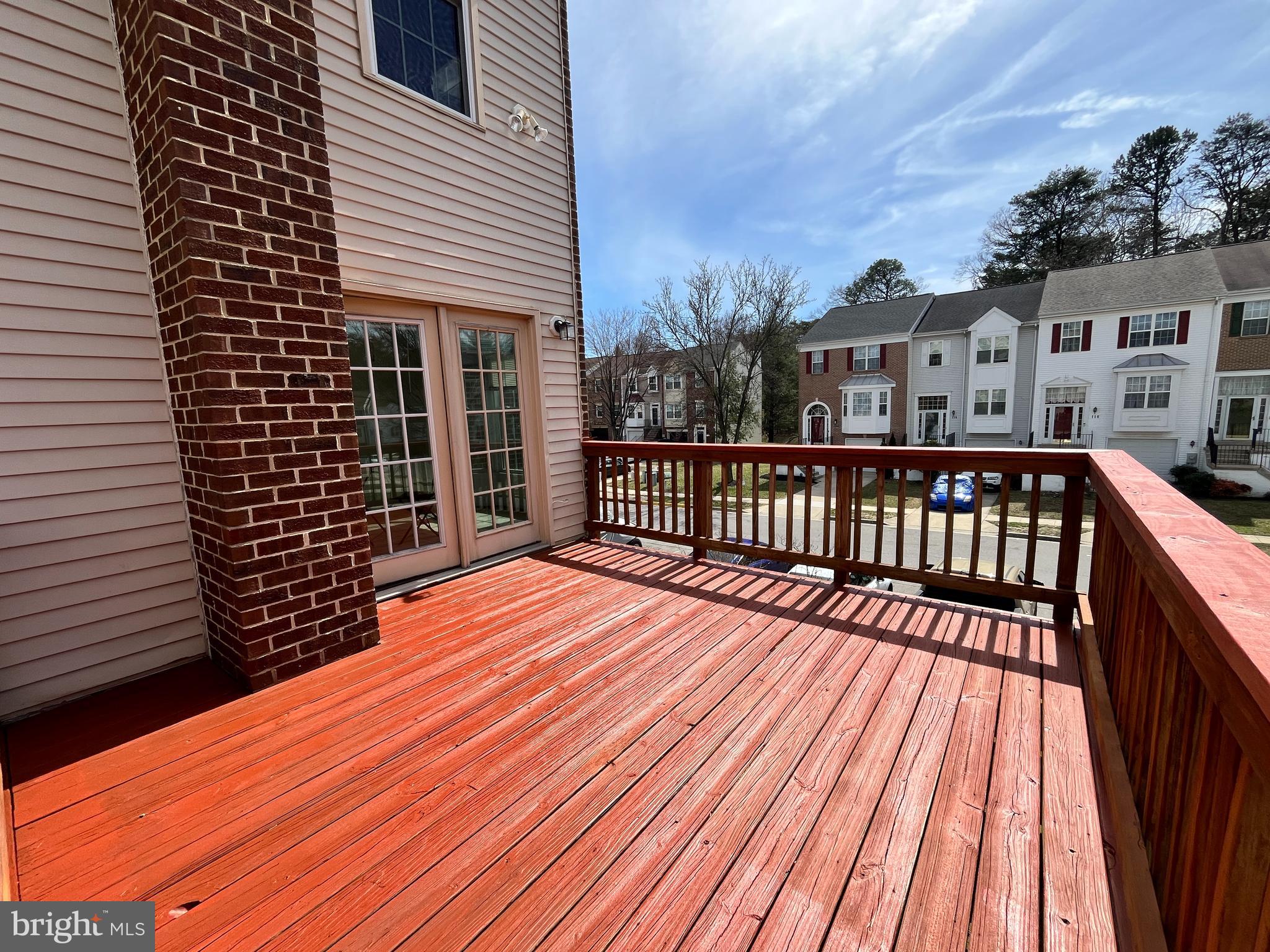 2034 Pinecroft Court Odenton, MD 21113 - Photo 26 of 31 a view of a wooden deck with large windows