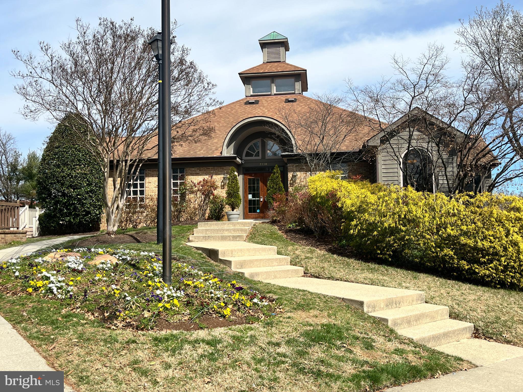 2034 Pinecroft Court Odenton, MD 21113 - Photo 29 of 31 a front view of a house with a yard