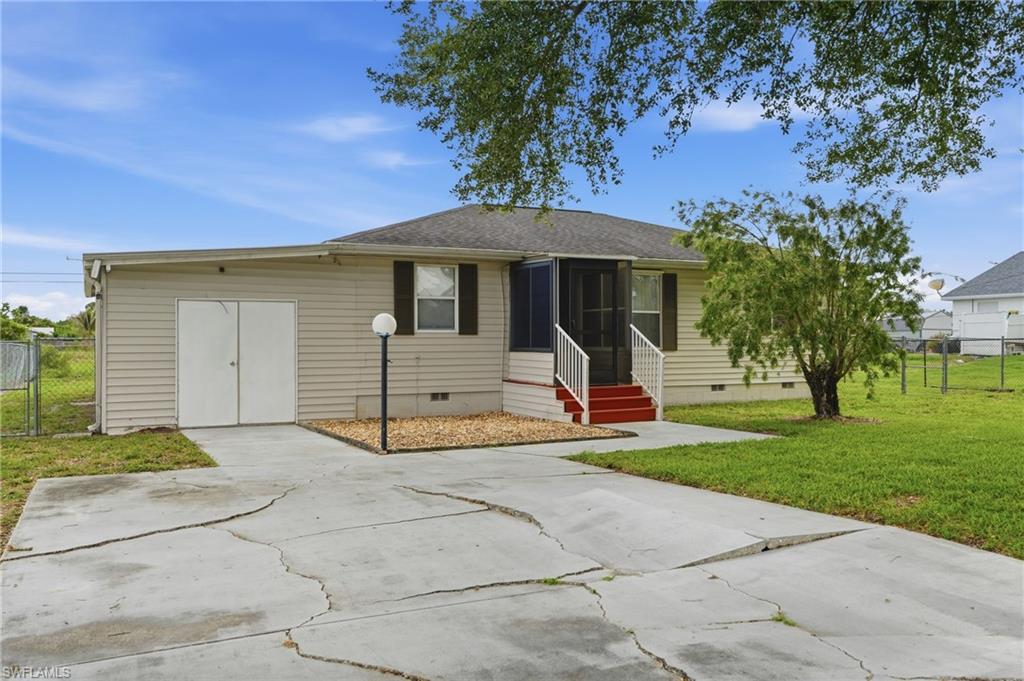 4302 7th Street Southwest Lehigh Acres, FL 33976 - Photo 6 of 32
