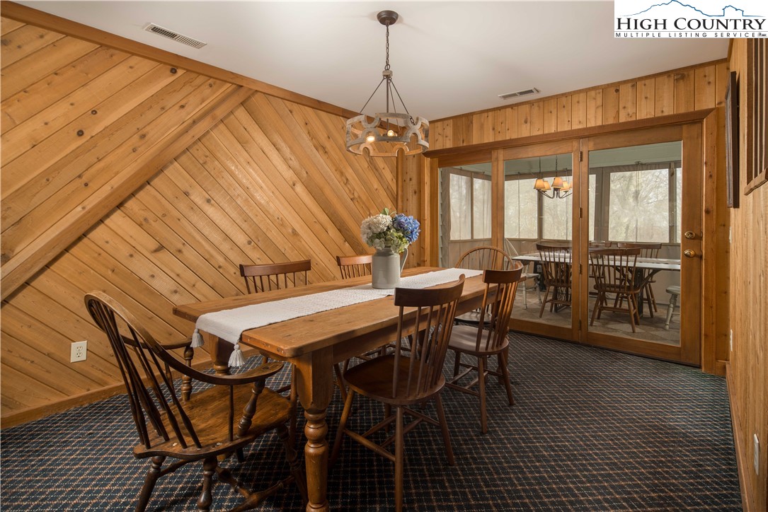 109 Old Field Road Beech Mountain, NC 28604 - Photo 20 of 50 a dining room with furniture and window