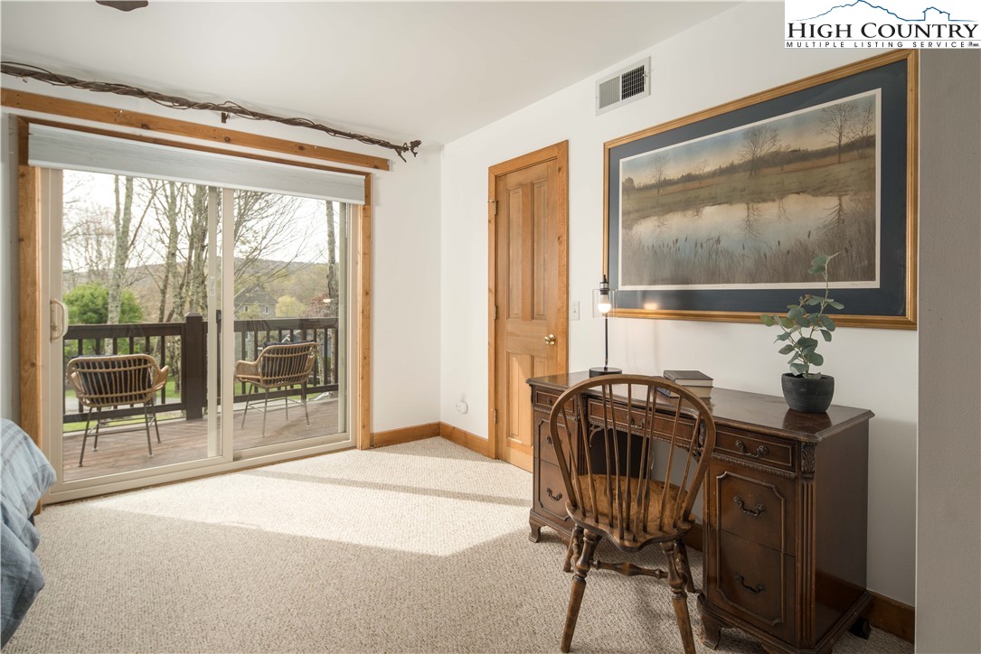 109 Old Field Road Beech Mountain, NC 28604 - Photo 33 of 50 a view of a workspace with furniture and window