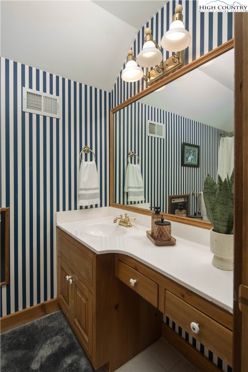 109 Old Field Road Beech Mountain, NC 28604 - Photo 35 of 50 a kitchen with a sink and cabinets