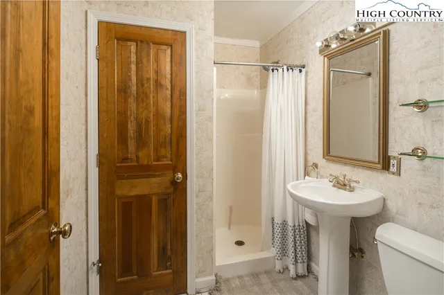 a view of a chairs and table in the patio