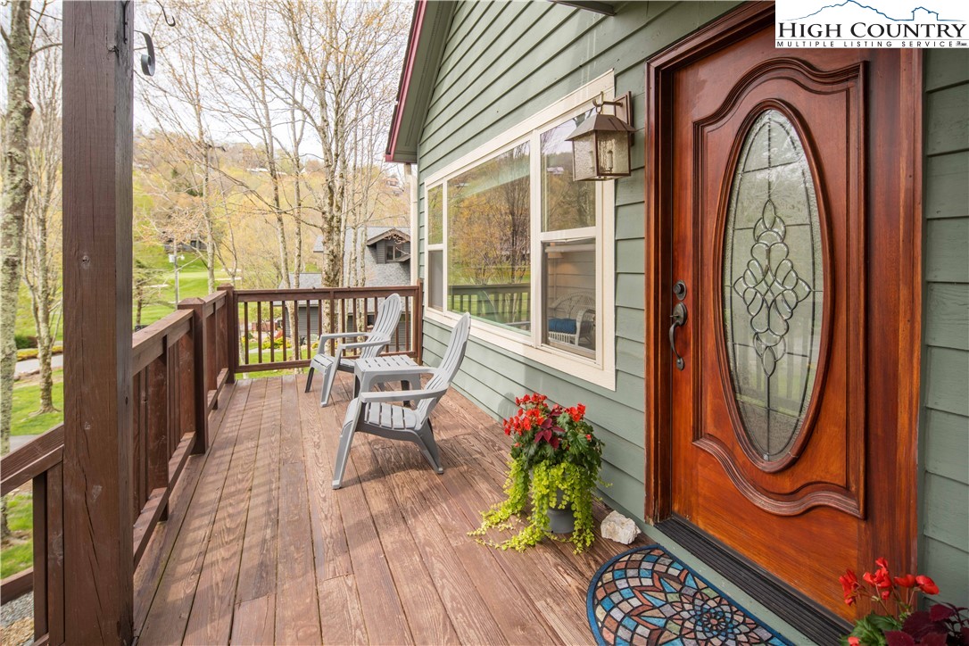 109 Old Field Road Beech Mountain, NC 28604 - Photo 7 of 50 a view of a two chairs in the balcony