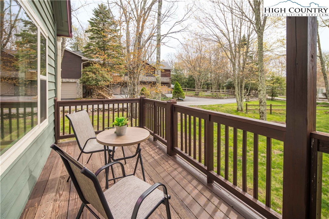 109 Old Field Road Beech Mountain, NC 28604 - Photo 9 of 50 a view of a two chairs in the balcony