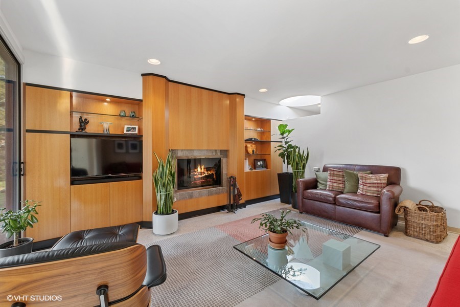1700 Ridge Road Highland Park, IL 60035 - Photo 16 of 56 a living room with furniture and a fireplace