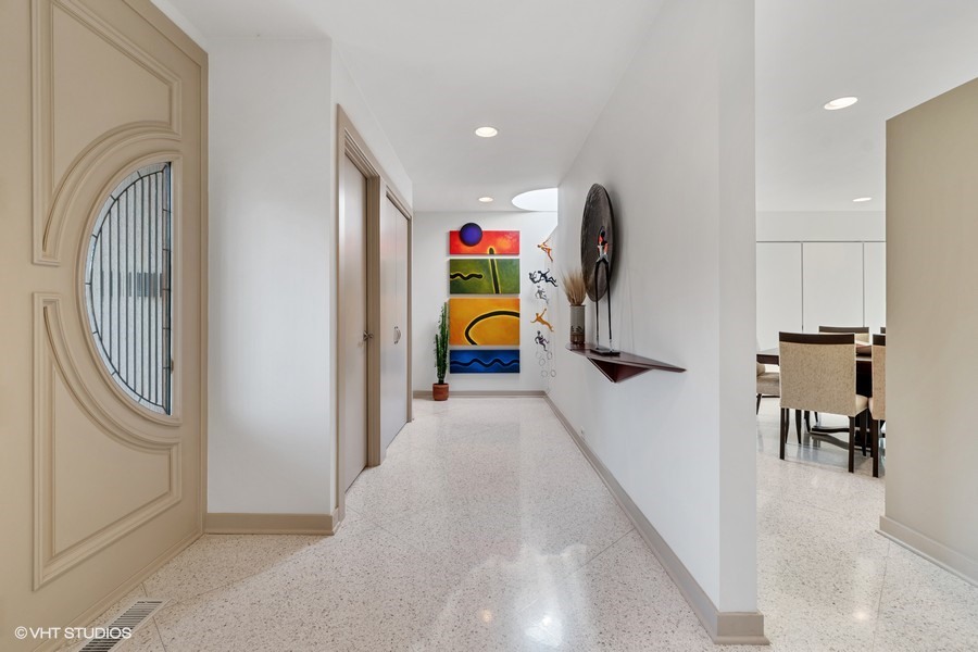 1700 Ridge Road Highland Park, IL 60035 - Photo 20 of 56 a view of a hallway with washer and dryer