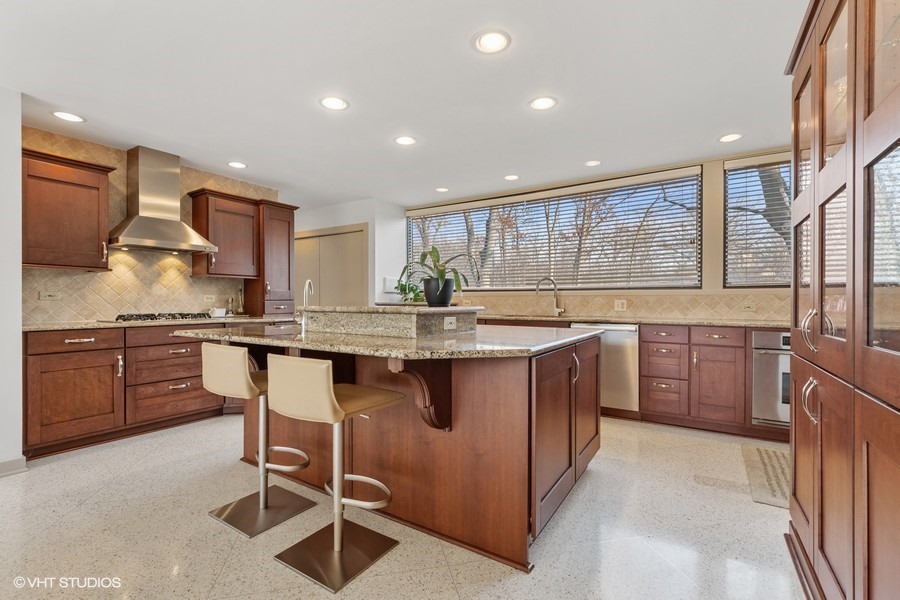 1700 Ridge Road Highland Park, IL 60035 - Photo 27 of 56 a kitchen with granite countertop a sink and counter space