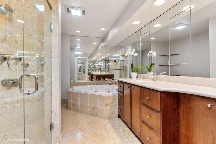 1700 Ridge Road Highland Park, IL 60035 - Photo 36 of 56 a bathroom with a double vanity sink mirror and shower