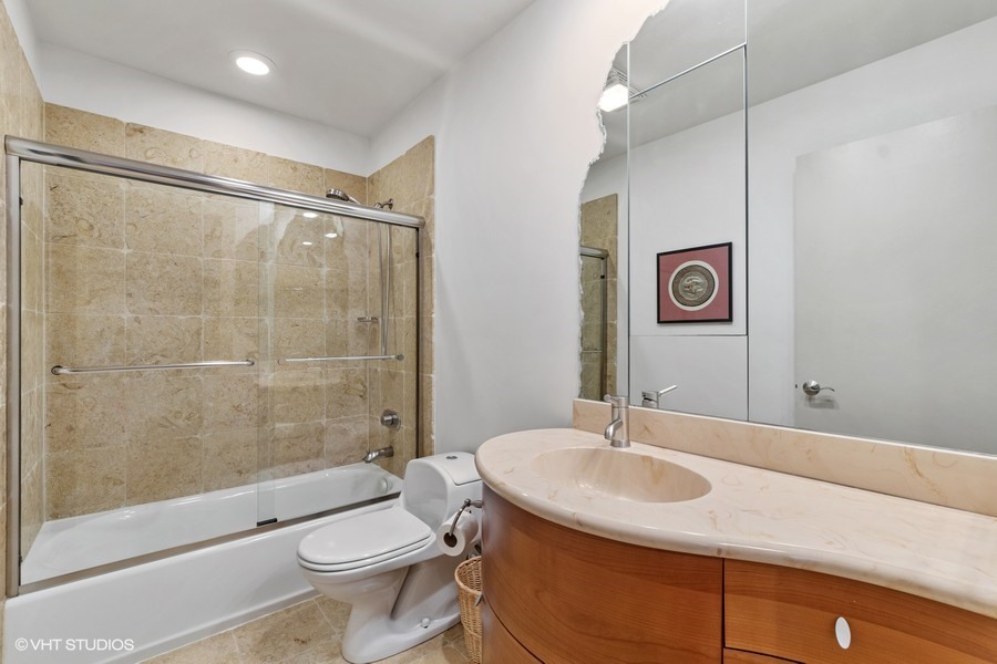1700 Ridge Road Highland Park, IL 60035 - Photo 39 of 56 a bathroom with a sink and a mirror