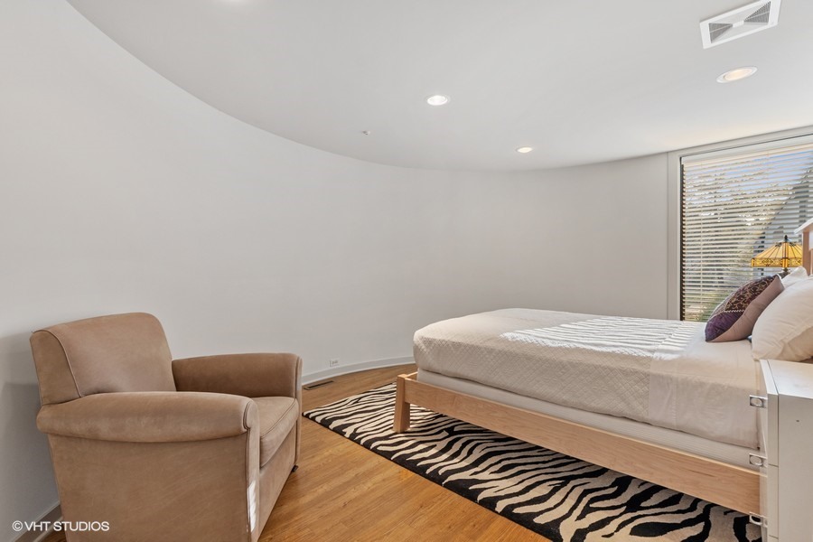 1700 Ridge Road Highland Park, IL 60035 - Photo 40 of 56 a bedroom with furniture and a couch