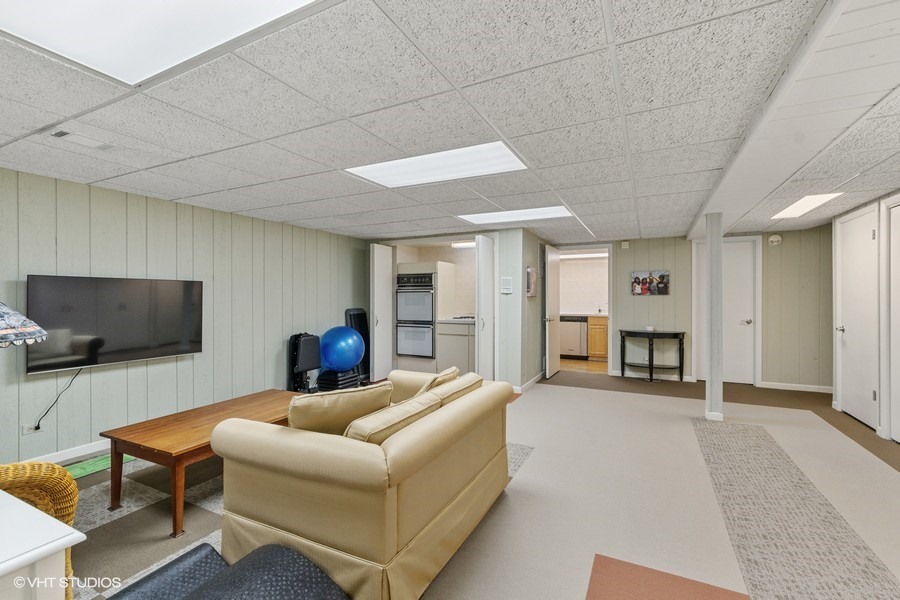 1700 Ridge Road Highland Park, IL 60035 - Photo 45 of 56 a living room with furniture and a flat screen tv