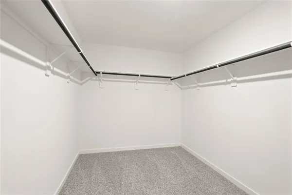 a view of a room with racks on the wall