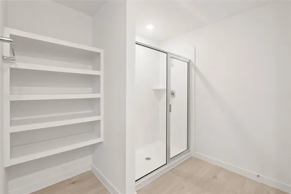 a view of an empty walk in closet