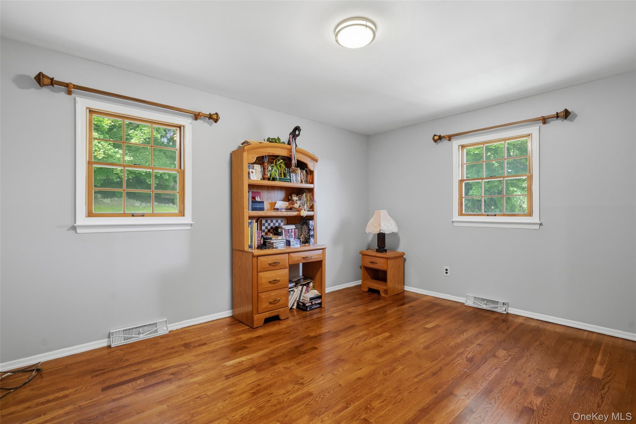 623 Cardinal Road Cortlandt Manor, NY 10567 - Photo 18 of 40 a view of a workspace with furniture and a window