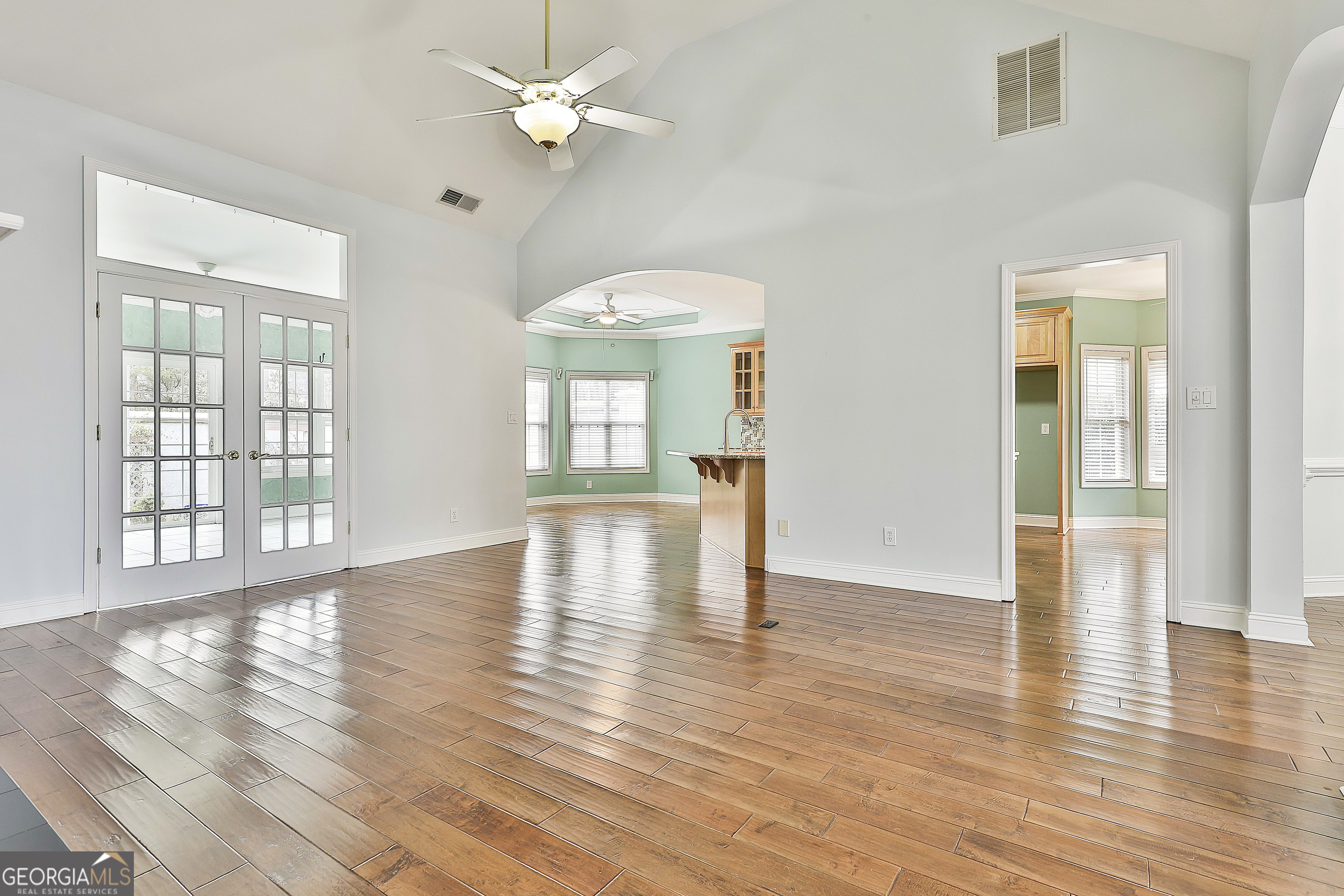 207 Prestwick Way North Stockbridge, GA 30281 - Photo 14 of 44 a view of an empty room with wooden floor and a window
