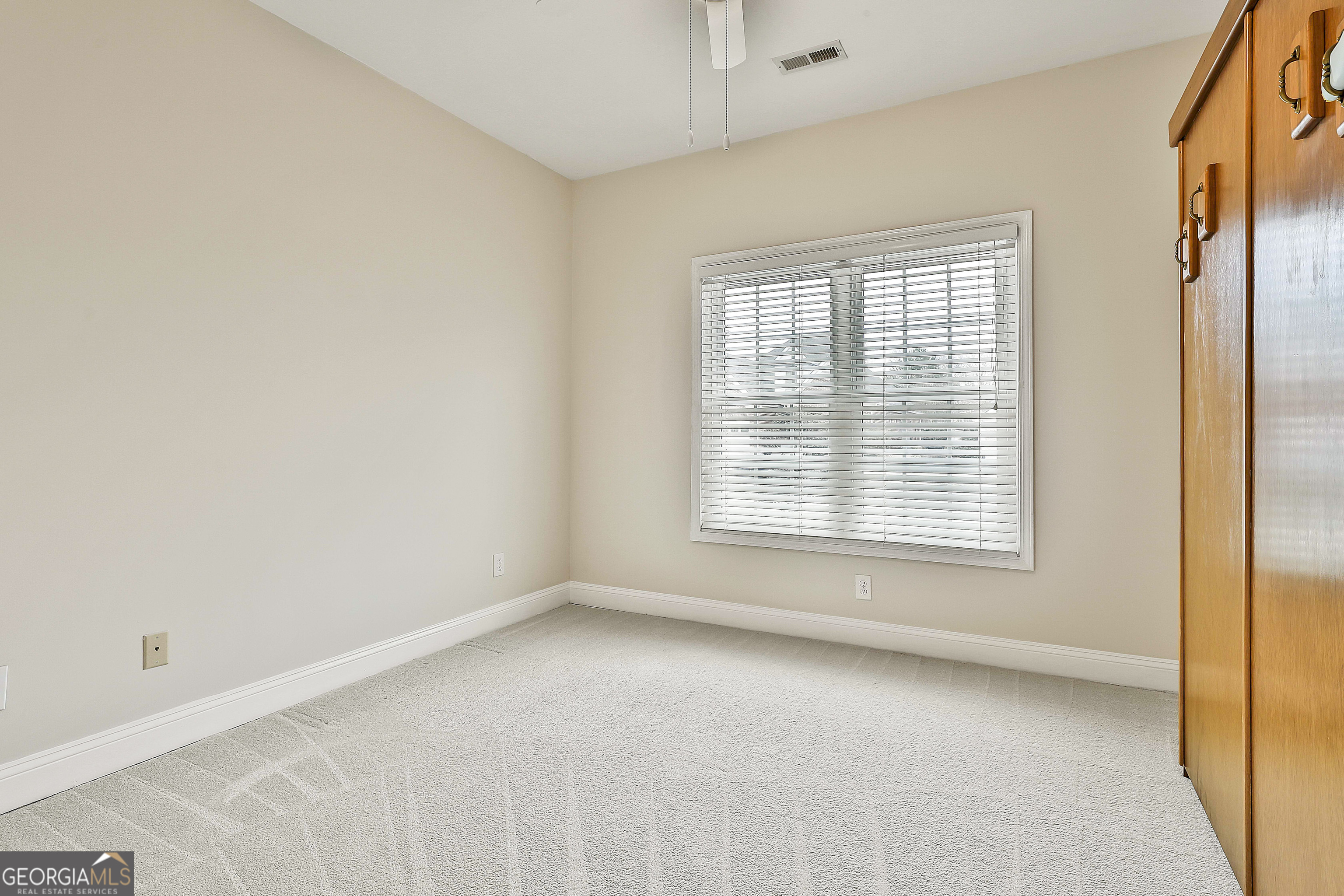 207 Prestwick Way North Stockbridge, GA 30281 - Photo 31 of 44 a view of an empty room with a window