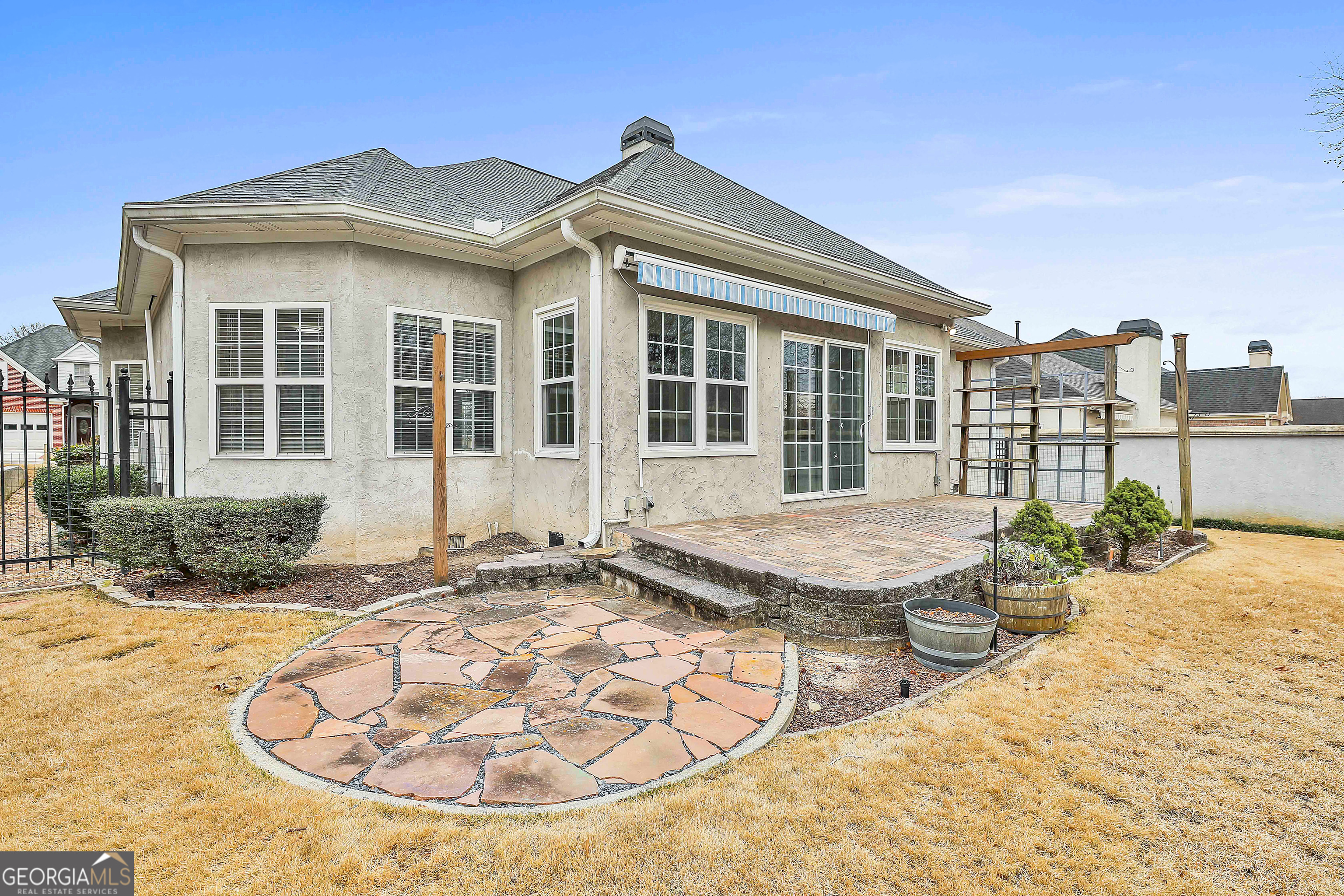 207 Prestwick Way North Stockbridge, GA 30281 - Photo 39 of 44 a view of a house with backyard and sitting area