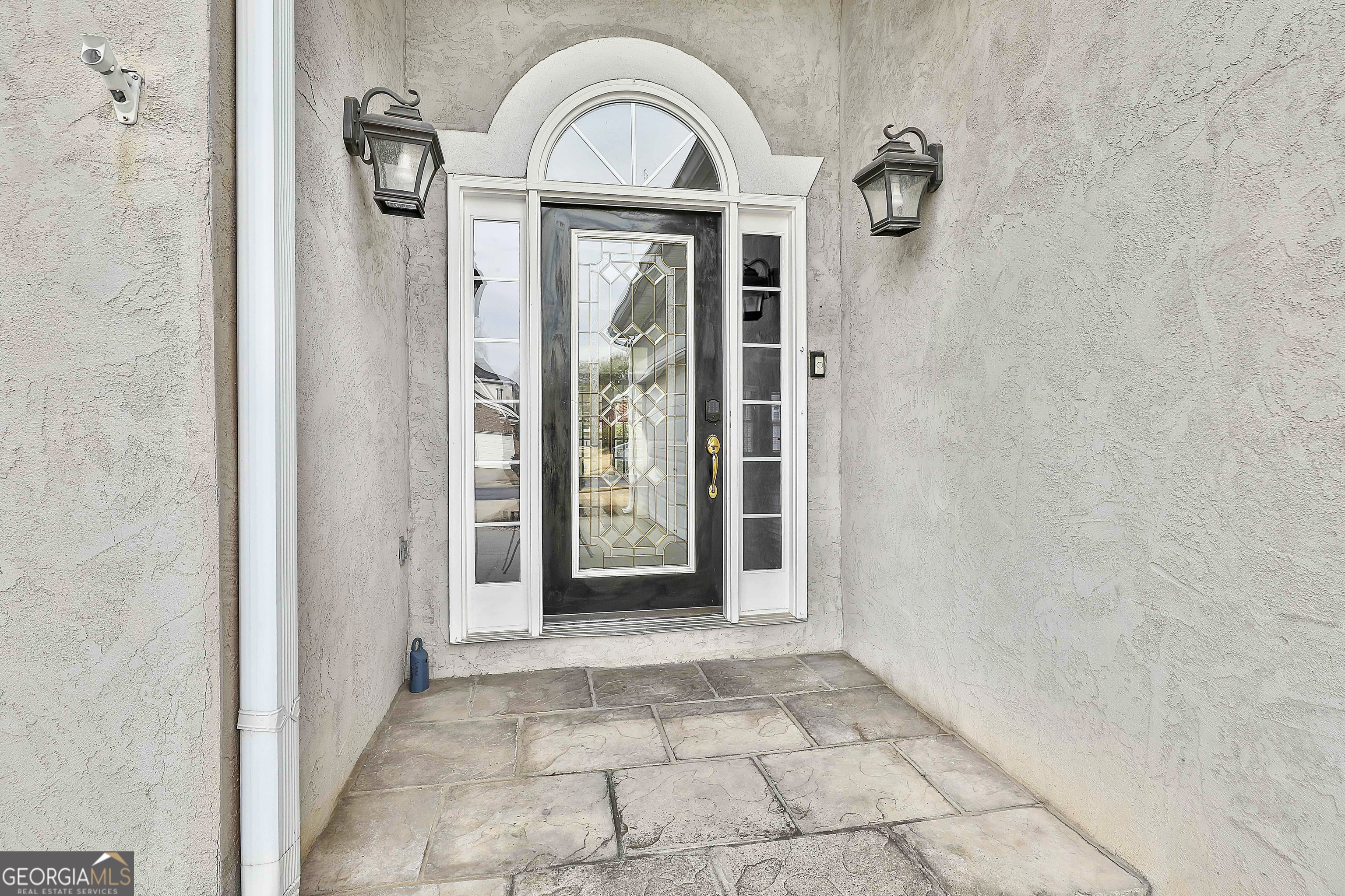 207 Prestwick Way North Stockbridge, GA 30281 - Photo 4 of 44 a view of a bathroom with a glass door shower