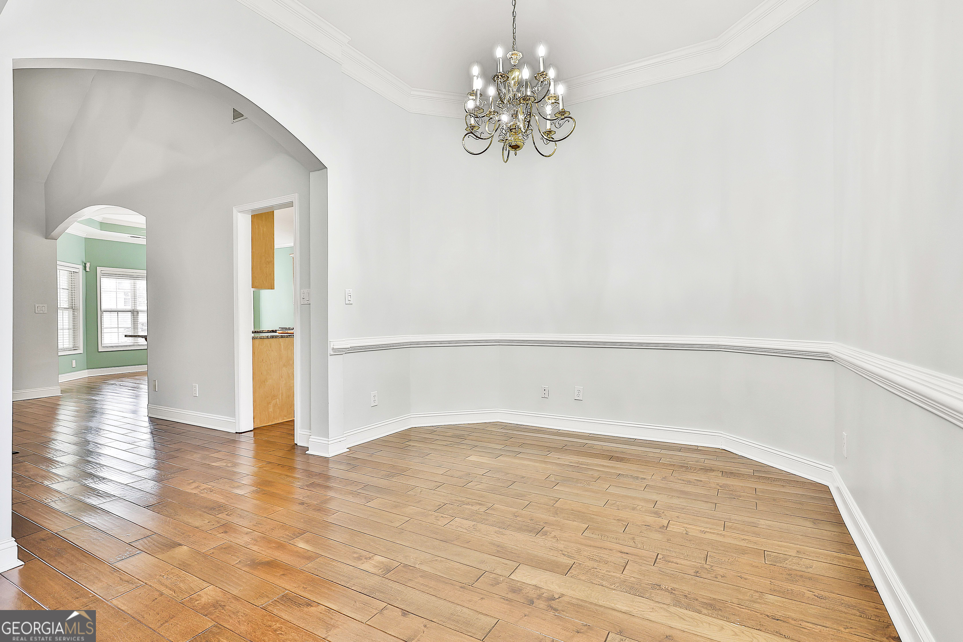 207 Prestwick Way North Stockbridge, GA 30281 - Photo 8 of 44 a view of an empty room with wooden floor