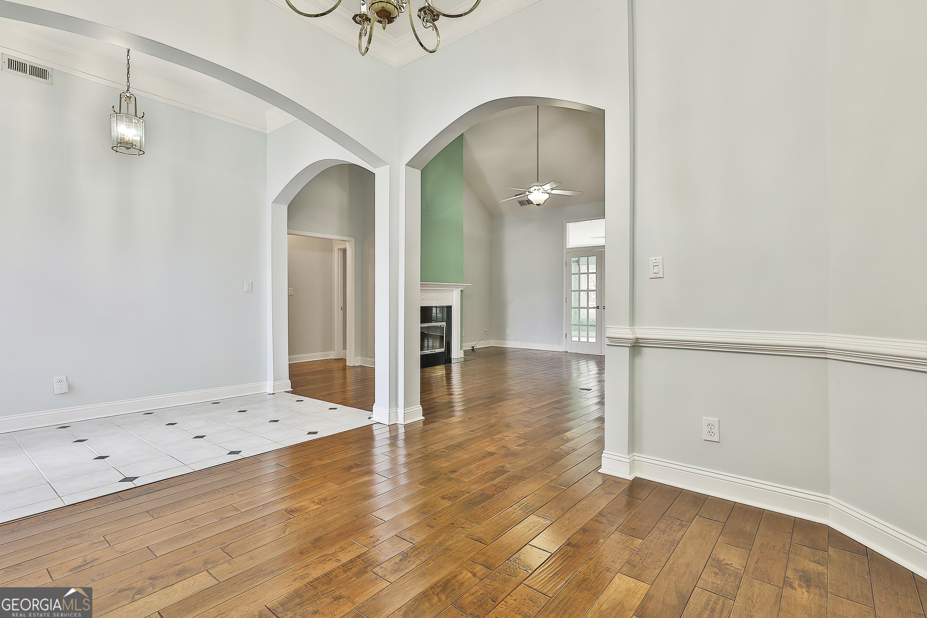 207 Prestwick Way North Stockbridge, GA 30281 - Photo 9 of 44 a view of a hallway with wooden floor