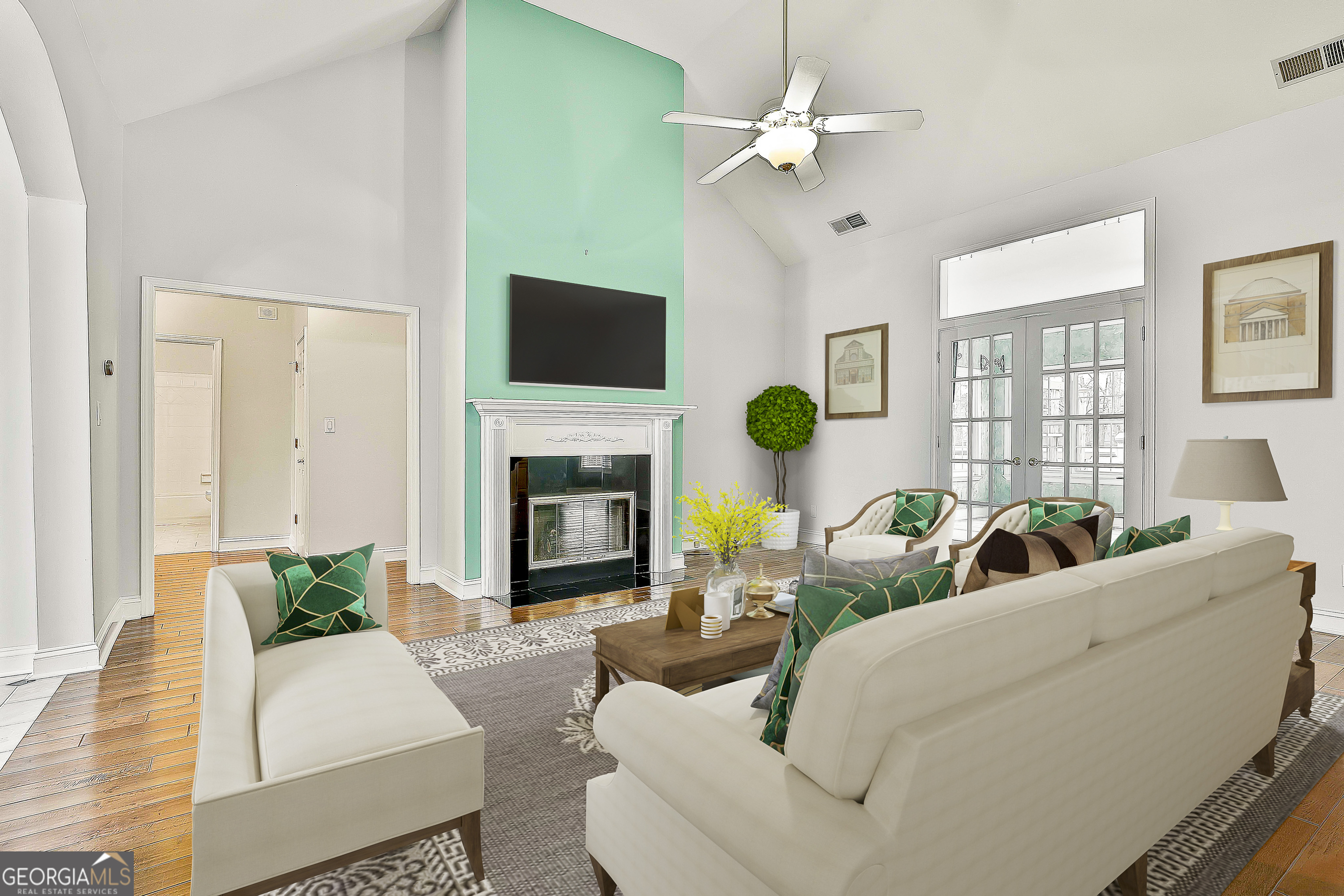 207 Prestwick Way North Stockbridge, GA 30281 - Photo 10 of 44 a living room with furniture a fireplace and a flat screen tv