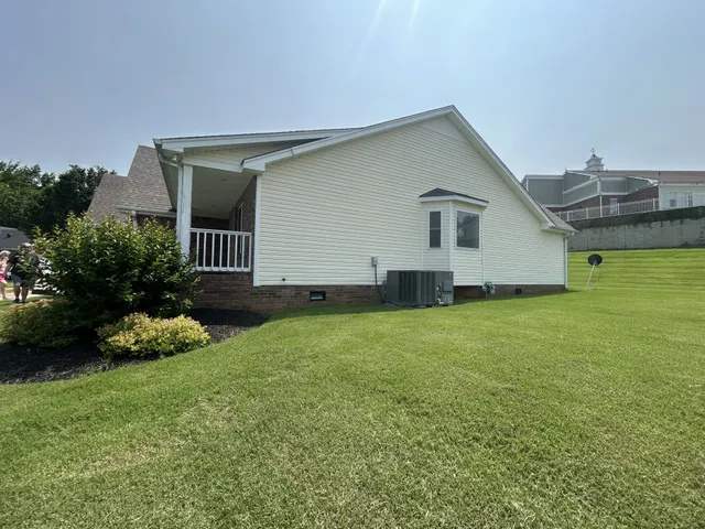 a house view with a garden space