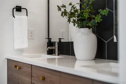 a view of a room with rack on the wall