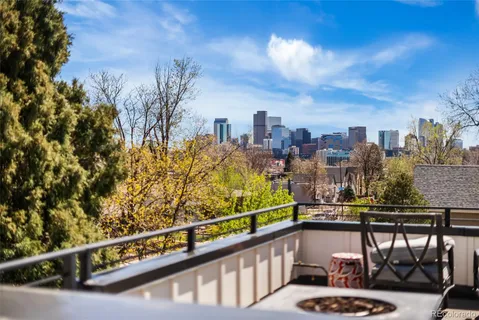 a view of a porch with wooden floor