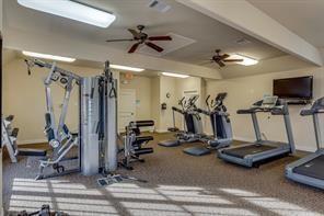 566 Rockingham Drive Irving, TX 75063 - Photo 19 of 22 a view of a room with gym equipment