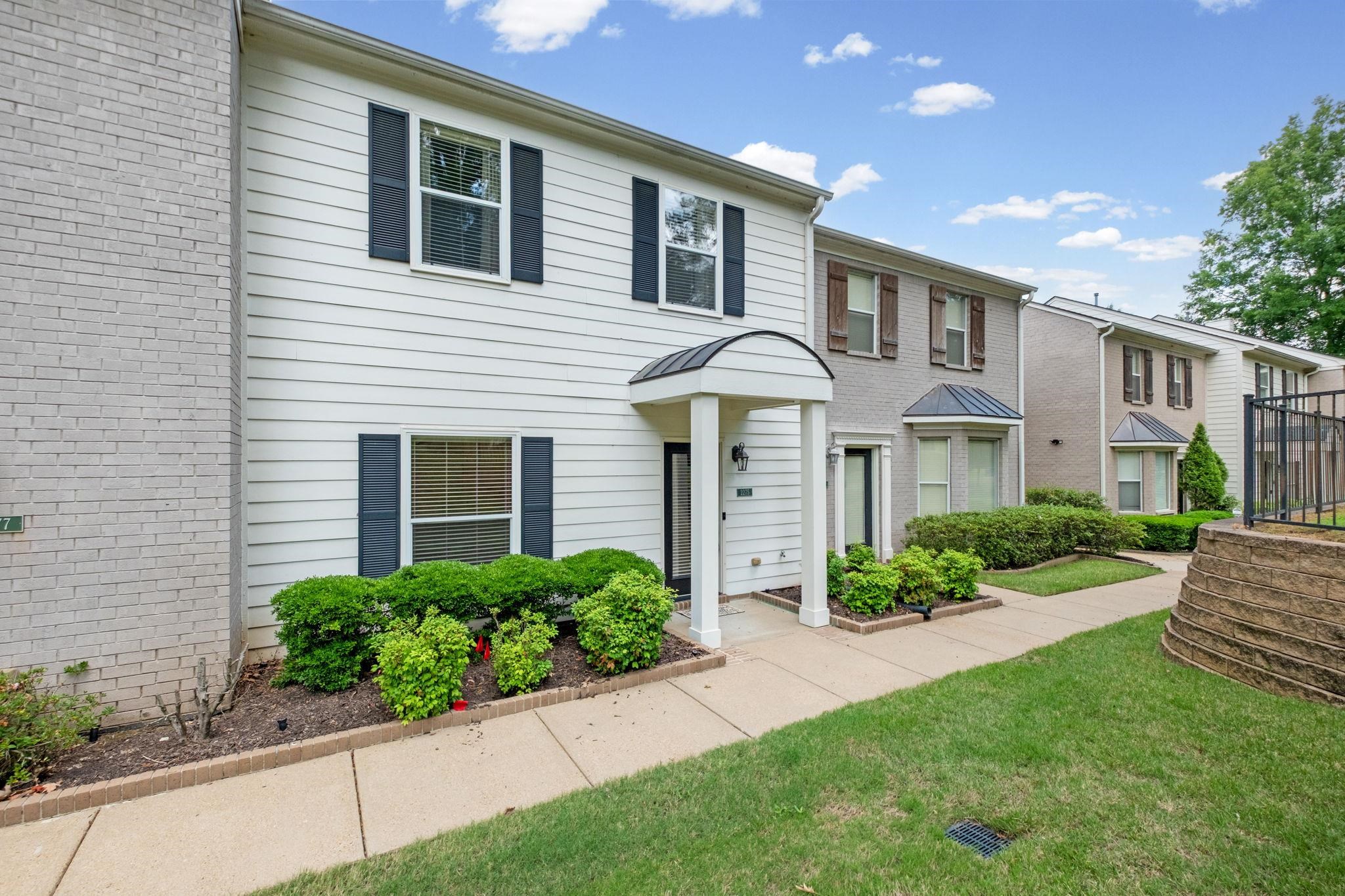 2275 McVay Road, Unit 2275 Germantown, TN 38138 - Photo 30 of 40 a front view of a house with a yard