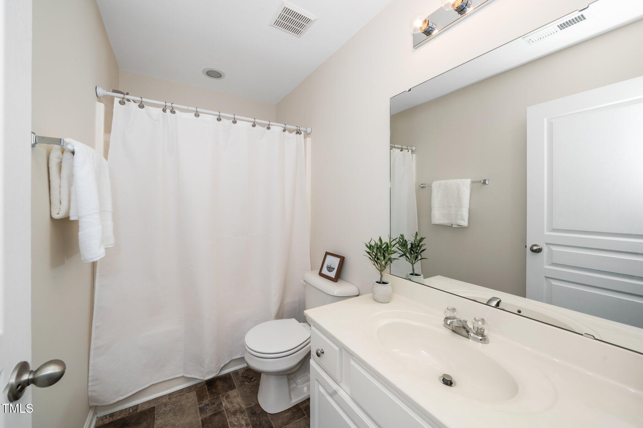 7753 Winners Edge Street Raleigh, NC 27617 - Photo 26 of 46 Hall Bath on upper level