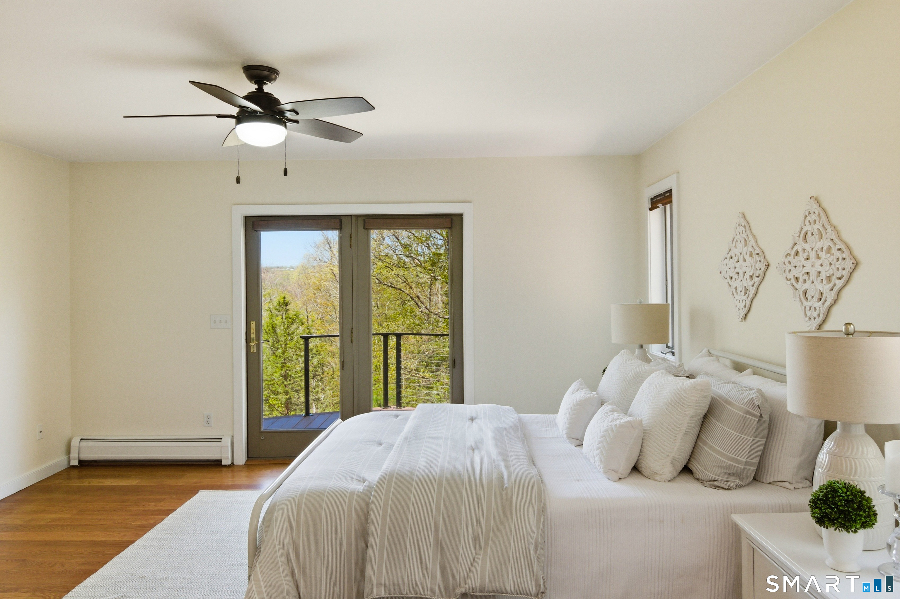 28 Garnet Road Roxbury, CT 06783 - Photo 6 of 35 Main Floor Master Bedroom with French Doors to Deck
