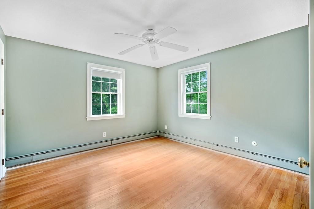 130 Senator Street Springfield, MA 01129 - Photo 27 of 35 an empty room with a window and a fan