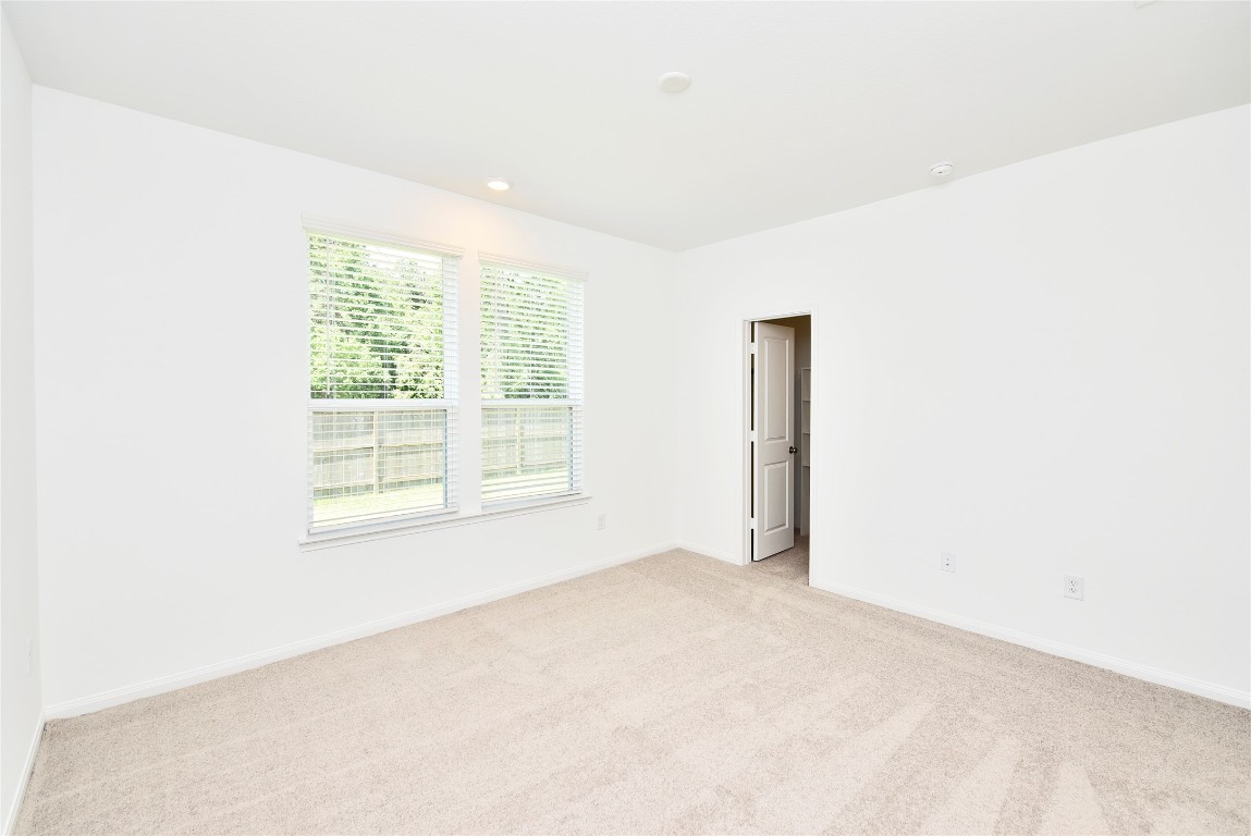 25473 Cilantro Drive Magnolia, TX 77355 - Photo 11 of 21 an empty room with a window