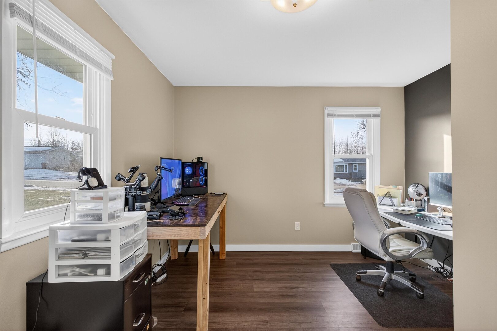 1136 4th Avenue North Clinton, IA 52732 - Photo 15 of 34 a view of a workspace with furniture and a window