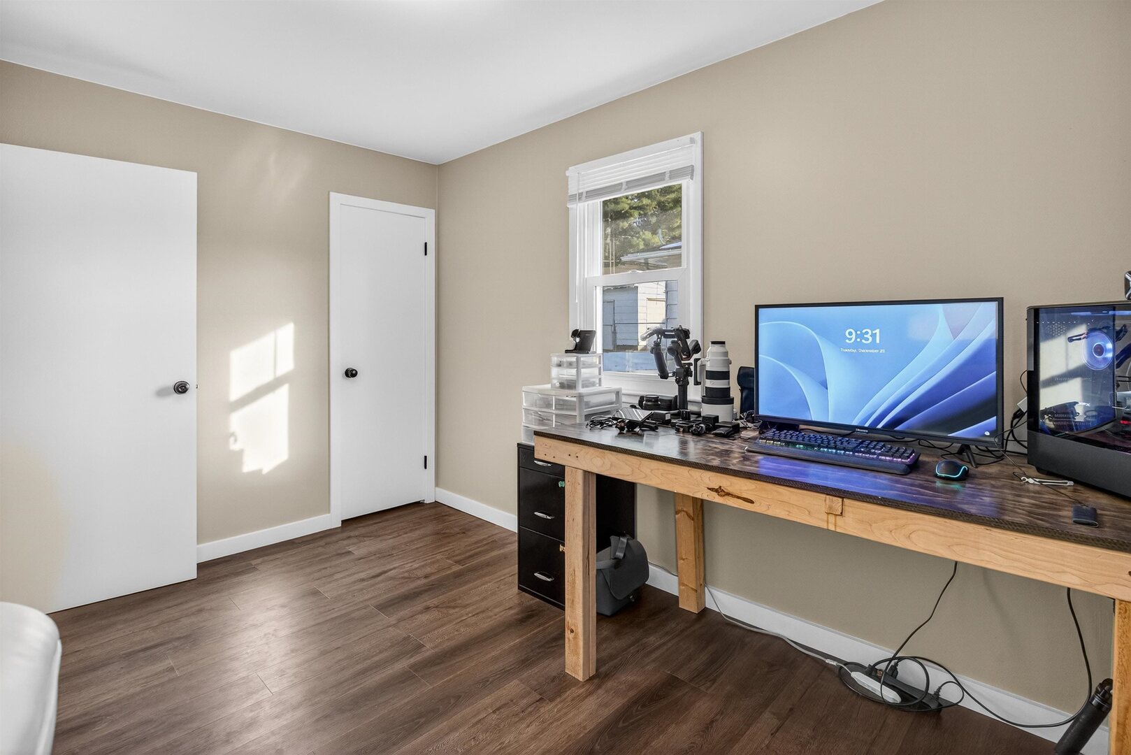 1136 4th Avenue North Clinton, IA 52732 - Photo 17 of 34 a room with wooden floor and white walls