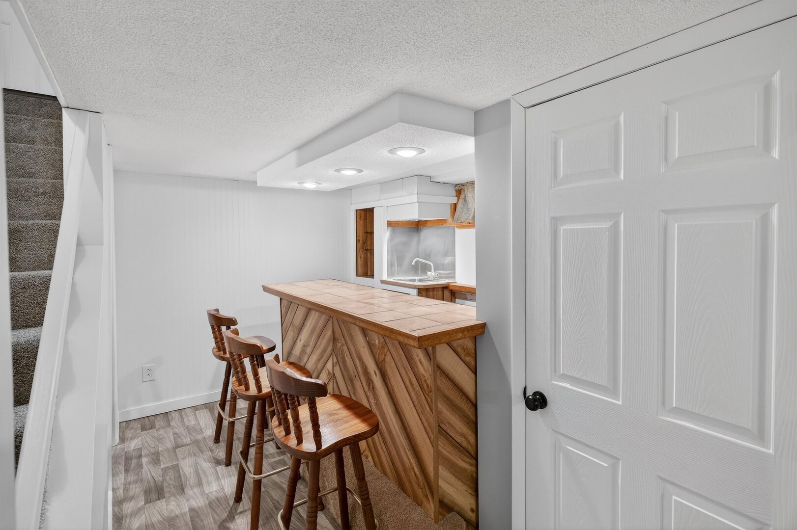1136 4th Avenue North Clinton, IA 52732 - Photo 26 of 34 a view of a dining room with furniture and wooden floor