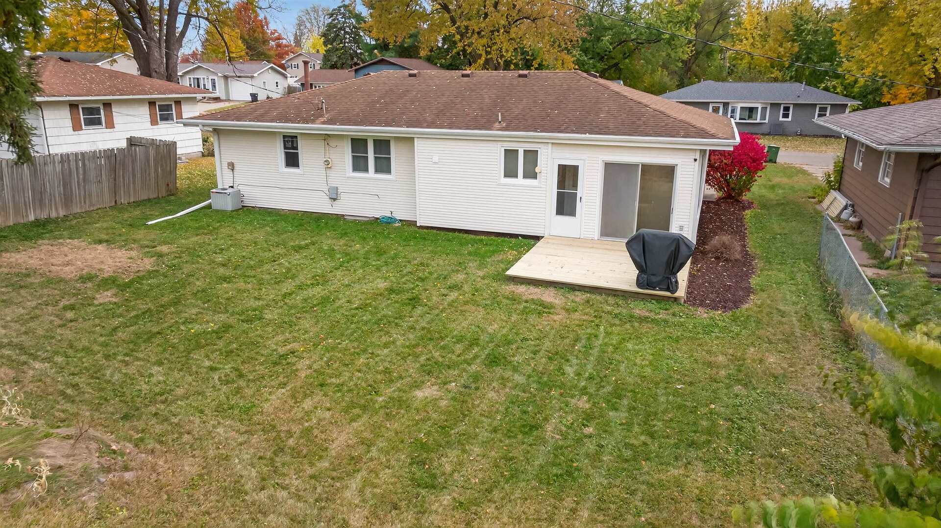 1136 4th Avenue North Clinton, IA 52732 - Photo 29 of 34 a front view of a house with a yard and garage