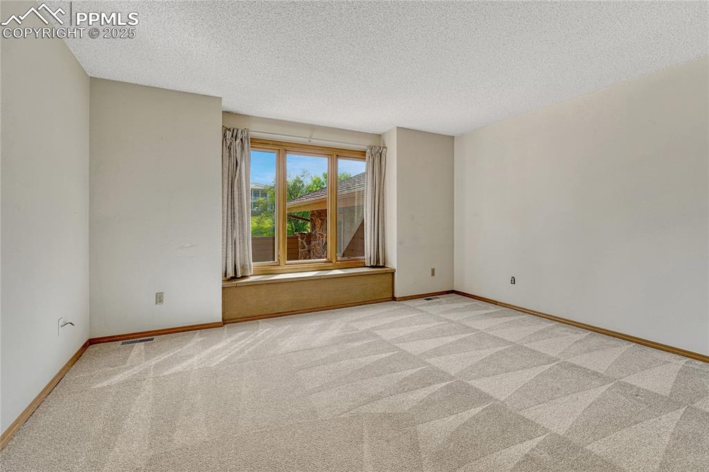 3120 Camels Ridge Lane Colorado Springs, CO 80904 - Photo 17 of 50 2nd Main Level Bedroom with Ensuite Full Bath
