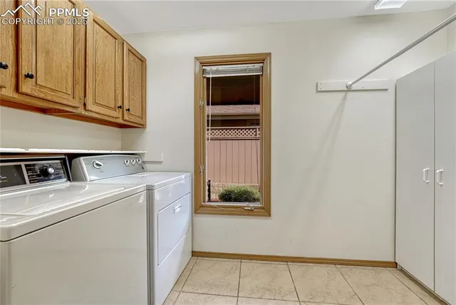 a utility room with closet dryer and washer