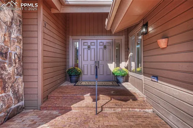 a view of a entryway door front of house