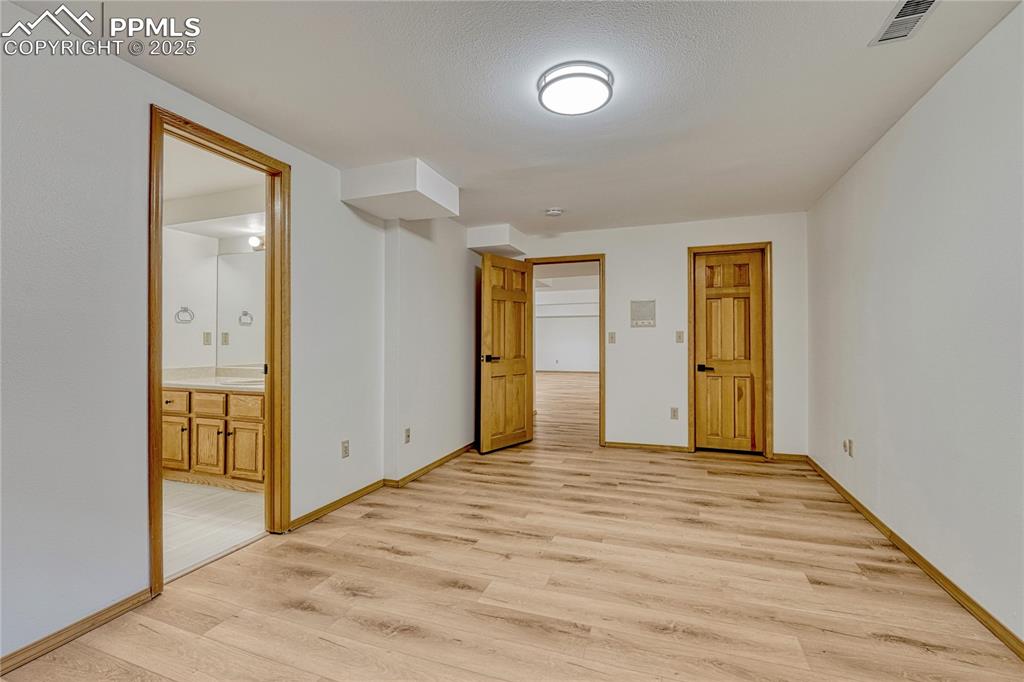 3120 Camels Ridge Lane Colorado Springs, CO 80904 - Photo 36 of 50 4th Bedroom, All New LVT Floors, New LED Light Fixtures, New Paint, Ensuite Bath