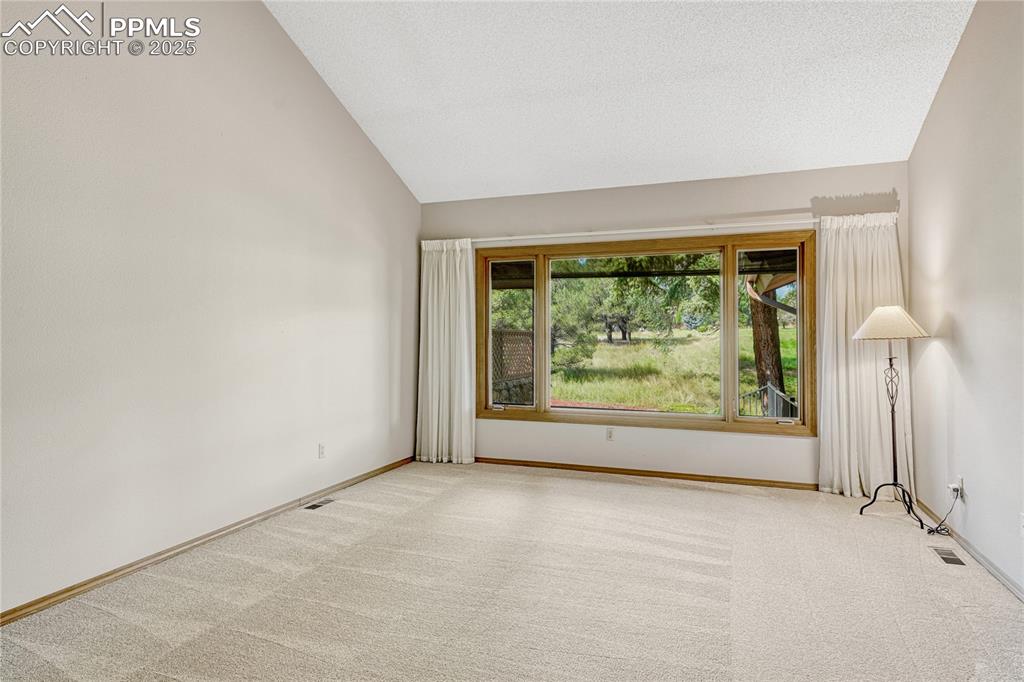 3120 Camels Ridge Lane Colorado Springs, CO 80904 - Photo 46 of 50 Vaulted Primary Suite with Large Windows to the West, Ensuite Bath